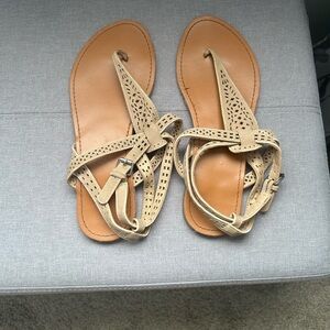 Used strappy sandals